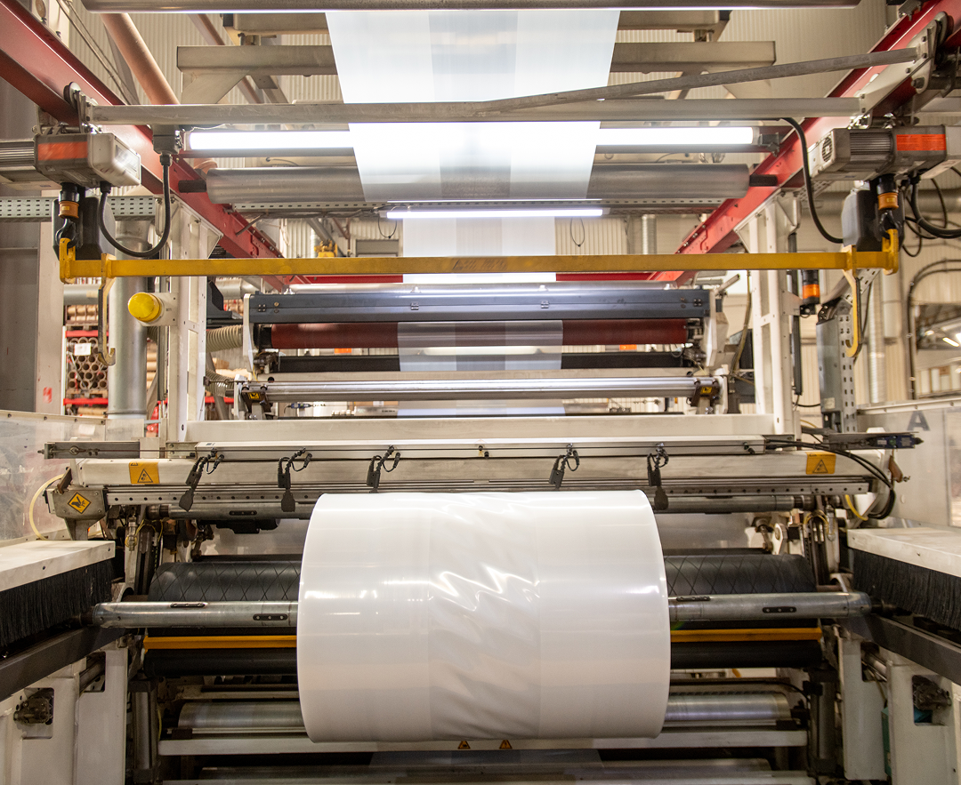Labelling technologies huge industrial machine with rolled